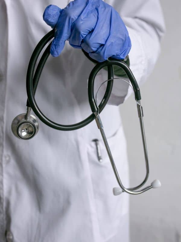 Stethoscope in doctor hand