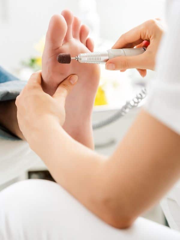 Podiatry treatment with patient