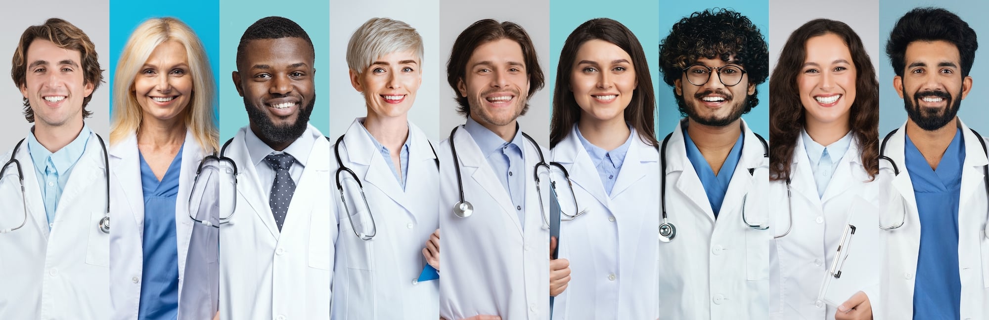 A diverse group of nine doctors and medical professionals, all smiling, standing in a row wearing white coats or scrubs with stethoscopes—experts who trust reliable medical billing and coding services to support quality patient care.