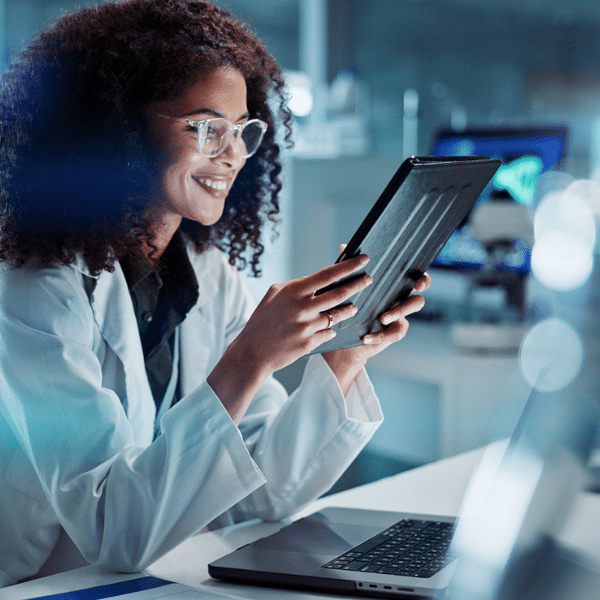 Healthcare provider meeting with a billing partner and shaking hands.