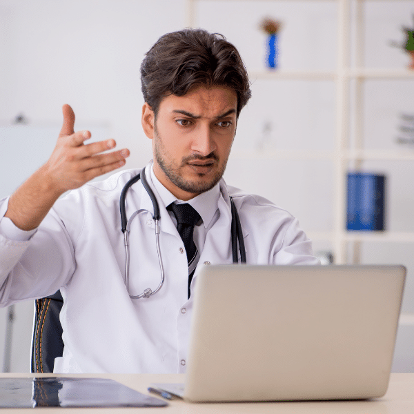 Doctor facing administrative overload due to billing complexity.